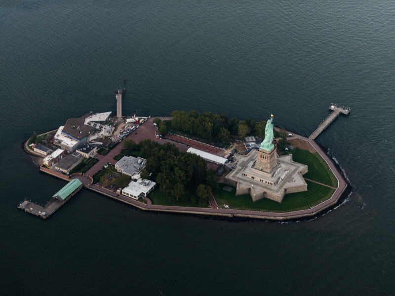 An aerial view of Statue of liberty and Ellis island